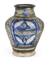 A Mamluk pottery vase, Syria, 14th century, of baluster form, underglaze decorated in cobalt, and...