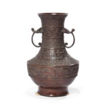 A Japanese bronze archaistic baluster vase Meiji period Cast with alternating borders of taotie...