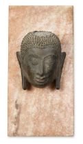 To Be Sold With No Reserve A gilt bronze fragmentary head of the Buddha, Thailand, 15th century,...