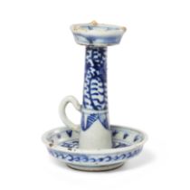 A Chinese blue and white candle holder Republic period Painted under the glaze with scrolling f...
