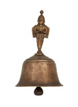To Be Sold With No Reserve A brass temple bell with figure of Garuda, North India, 18th cent...