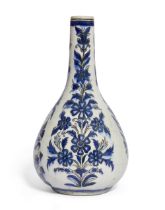 To Be Sold With No Reserve A Qajar blue and white floral pottery bottle vase, Persia, 19th centu...