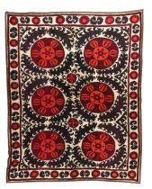 A large medallion-type Susani, Samarkand, Uzbekistan, early 20th century, in red, black and cream...