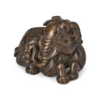 A large Chinese bronze 'elephant' scroll weight Republic period The recumbent beast well-modell...