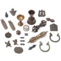 A group of Tibetan copper alloy implements and a box of coins 19th-20th century Comprising: two...