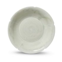 A Chinese qingbai lobed dish Southern Song dynasty The simple form raised on a straight circula...