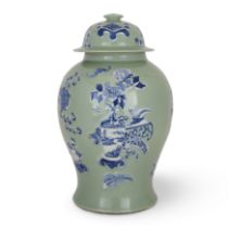 A large Chinese celadon-ground blue and white moulded baluster jar and cover 20th century  With...
