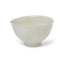 A large Korean white-glazed bowl Joseon dynasty Of oval form, raised on tall straight foot to d...