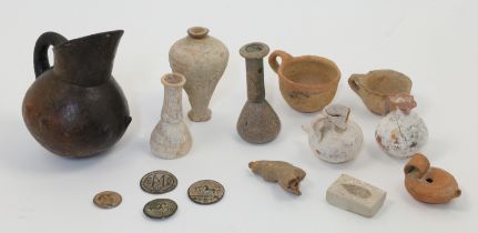 A collection of Mediterranean and Middle Eastern earthenware and glass, Not Ancient, to include: ...