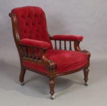 A Victorian mahogany library armchair, third quarter 19th century, button back velour upholstery,...