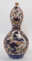 A large Japanese porcelain double gourd vase, Meiji period, late 19th century, decorated in the I...