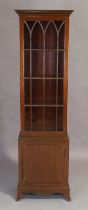 A mahogany bookcase by Saridis, Greek, of George III style, 20th century, 186cm high, 56cm wide, ...