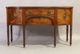 A George III mahogany bow front sideboard, last quarter 18th century, with three drawers and one ...