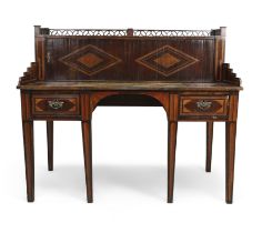 A George III mahogany and marquetry desk, last quarter 18th century, the pierced gallery top abov...