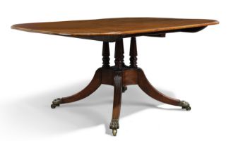 A Regency mahogany breakfast table, first quarter 19th century, the rounded rectangular tilt-top ...
