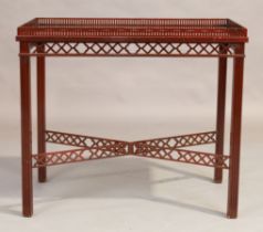 A mahogany silver table by Saridis, Greek, of George III style, 20th century, pierced gallery top...