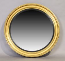 A large circular giltwood mirror, 20th century, the plate with bevelled edge, 100cm diameter