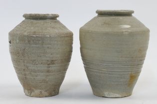 Two Chinese pottery shipwreck jars, each with high shoulder and squat neck, the smaller of the tw...