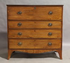 A Regency mahogany secretaire chest, circa 1820, the top drawer with fall front enclosing tooled ...