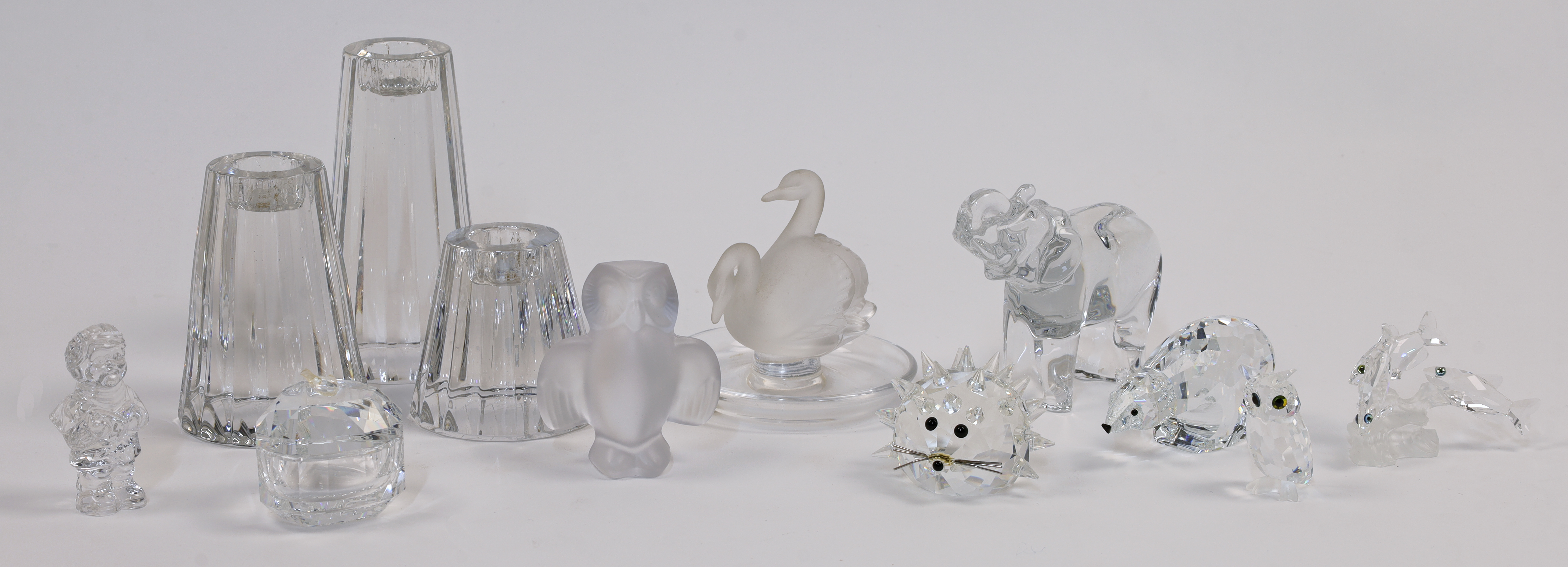 A collection of crystal and glass ornaments, 20th century, including examples by Lalique, Baccara...