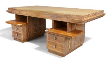 French  Desk, circa 1940/50  Limed oak, steel, brass, leather  75cm high, 207cm wide, 120cm deep
