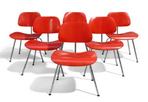 Charles and Ray Eames for Vitra  Six 'DCM' chairs, 1998  Red dyed birch plywood, chromed steel  ...