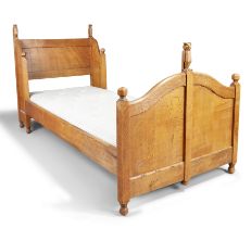 Arts & Crafts  Single bed, the frame with carved owl, hawk and pelican finials, early 20th centu...