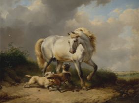 Manner of Philips Wouwerman,  19th century-  Two dogs provoking a white stallion in a landscape,...