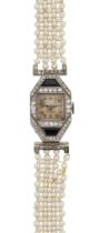Swiss. A Platinum, onyx and diamond set cocktail watch signed Van Cleef and Arpels on dial on pea...