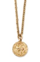 An early 20th century chased globe pendant, circa 1900, suspended on a 9ct gold filed trace link ...