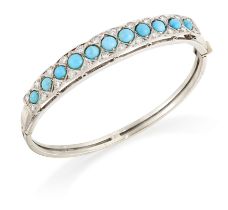 A turquoise and diamond bangle, the upper half with a row of round turquoise cabochons with pairs...