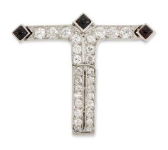 An Art Deco diamond and onyx brooch, of T form, grain set with old brilliant cut diamonds and wit...