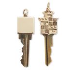 Two gold mounted keys, one with Cadillac logo design finial, engraved verso 'to my beauty, for he...