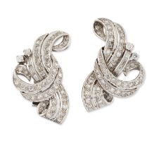 A pair of 18ct white gold diamond earrings, of brilliant cut diamond scrolling cluster design, Lo...