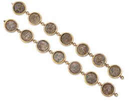 A pair of coin mounted bracelets, with reproduction ancient coins in spectacle settings, to hook ...