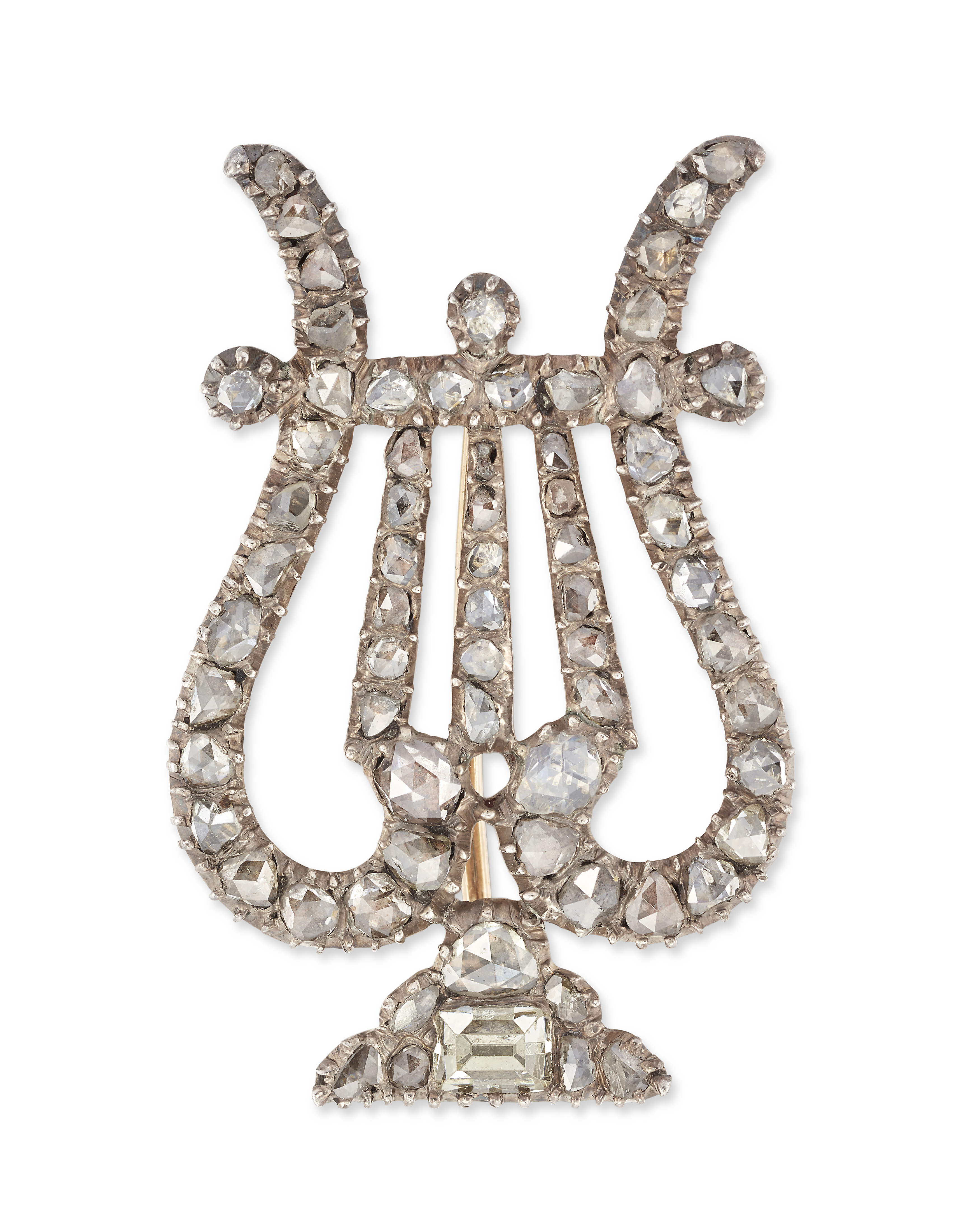 A Georgian diamond brooch, designed as a lyre set with rose cut diamonds throughout, and single t...