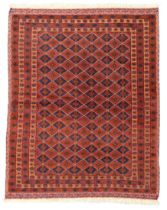 An Afghan Belouch rug, third quarter 20th century, part flat woven, the central field with repeat...