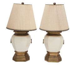 A pair of porcelain and lacquered-brass table lamps, mid-20th century, of octagonal baluster form...