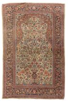 A Persian Sarouk rug, third quarter 20th century, the central field with vase of flowers design, ...