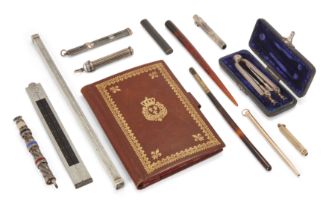 A collection of architectural and writing instruments, comprising: a French silver and ebony moun...