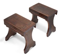 A pair of English elm and oak stools, 18th century and later, 36cm high, 36cm wide, 23cm deep (2)...