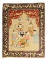 A Persian Isfahan pictorial rug, first quarter 20th century, the central field with figures in an...