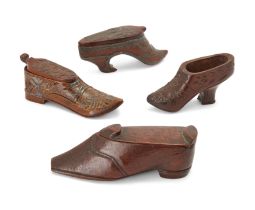 A group of four treen shoe snuff boxes, early 19th century, two with pewter inlay, the largest - ...