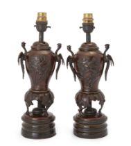 A pair of Japanese bronze vases converted to lamps, Meiji period, early 20th century, the vases w...