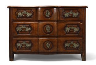 A provincial Louis XV fruitwood serpentine commode, first quarter 18th century, with three short ...