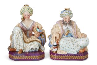 A pair of Paris (Jacob Petit) porcelain figural scent-bottles, mid-19th century, blue J.P. marks,...