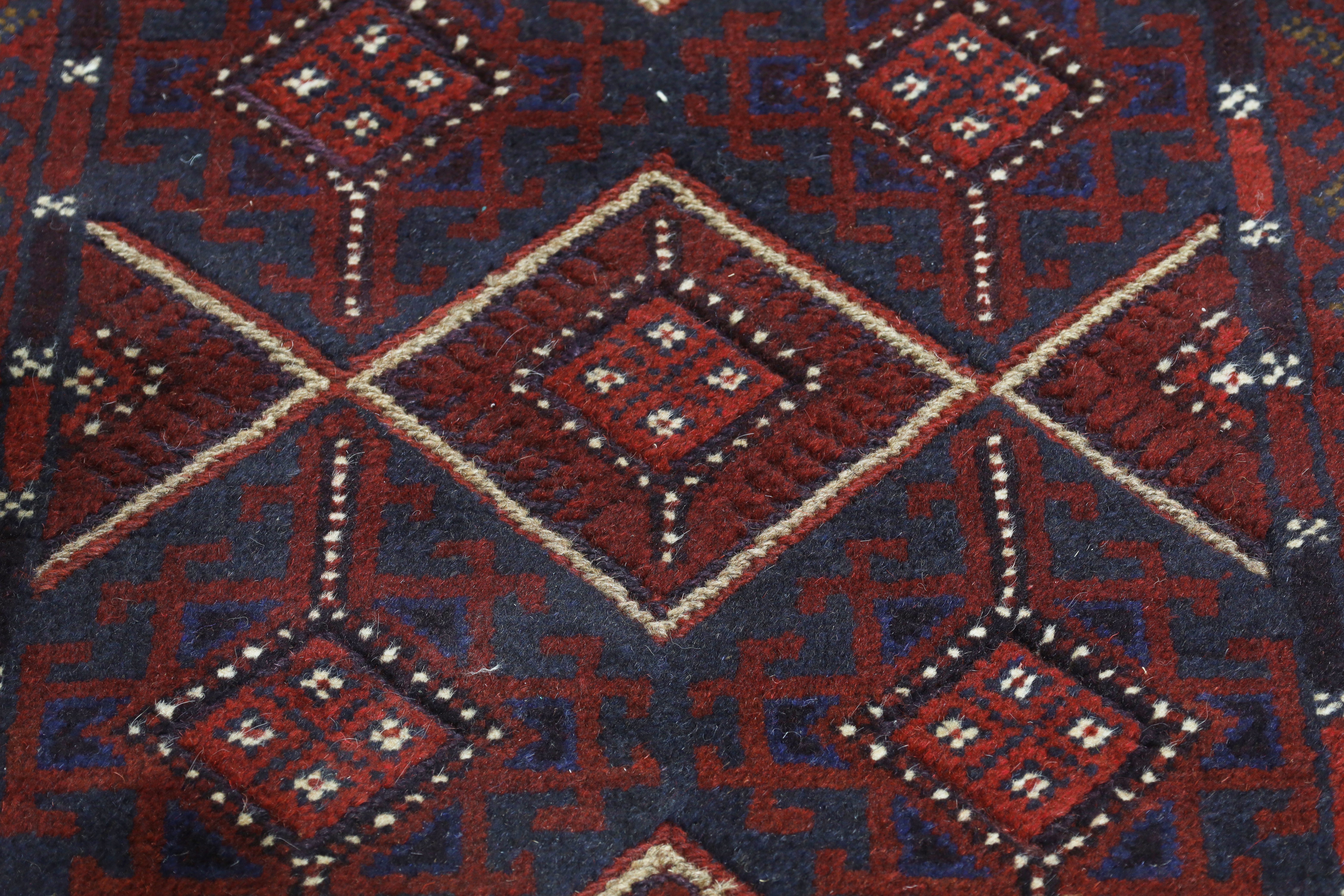 An Afghan Mushwani runner, third quarter 20th century, the central field with geometric diamond m... - Image 3 of 4