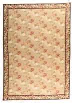 A large needlepoint wall hanging, first quarter 20th century, the central field with floral desig...