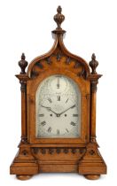 A Victorian Gothic Revival oak bracket clock, by William Johnson, London, third quarter 19th cent...