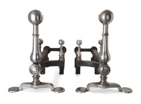 A pair of late Victorian steel and wrought-iron andirons, c.1890, each with spherical finial, the...